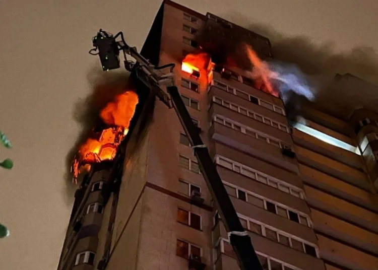 Flames and smoke rise from an apartment building damaged during a Russian drone strike, amid Russia's attack on Ukraine, in Kyiv, Ukraine October 25, 2024. Press service of the State Emergency Service of Ukraine/Handout via REUTERS ATTENTION EDITORS - THIS IMAGE HAS BEEN SUPPLIED BY A THIRD PARTY.