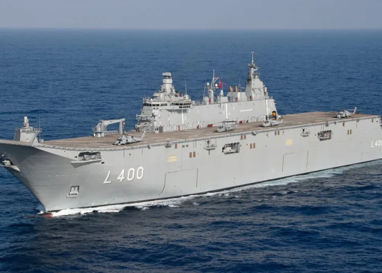 The Turkish Navy amphibious assault ship TCG Anadolu (L400) steams in the Mediterranean Sea, Aug. 21, 2023. Anadolu steamed in formation with the world's largest aircraft carrier USS Gerald R. Ford (CVN 78) and other Turkish ships. Gerald R. Ford is the U.S. Navy's newest and most advanced aircraft carrier, representing a generational leap in the U.S. Navy's capacity to project power on a global scale. The Gerald R. Ford Carrier Strike Group is on a scheduled deployment in the U.S. Naval Forces Europe area of operations, employed by U.S. Sixth Fleet to defend U.S., allied, and partner interests. (U.S. Navy photo by Mass Communication Specialist 2nd Class Jackson Adkins)