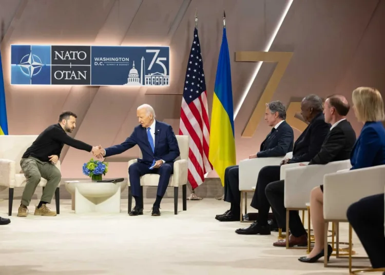 Secretary Antony J. Blinken looks on as President Joe Biden shakes hands with Ukrainian President Volodymyr Zelenskyy during the NATO Summit in Washington, D.C., July 11, 2024. (Official State Department photo by Chuck Kennedy)