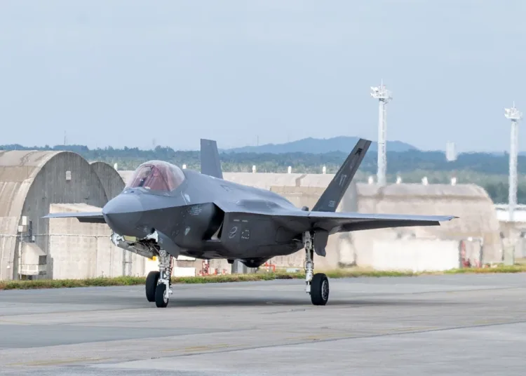A U.S. Air Force F-35A Lightning II assigned to the 134th Expeditionary Fighter Squadron taxis past Airman 1st Class Connor Blevins, 158th Fighter Wing crew chief, at Kadena Air Base, Japan, Jan. 13, 2025. The 134th FS will be integrating with F-22 Raptors and F-16C Fighting Falcons to continually provide forward fighter capabilities in support of theater deterrence and U.S. Indo-Pacific Command objectives. (U.S. Air Force photo by Senior Airman Tylir Meyer)