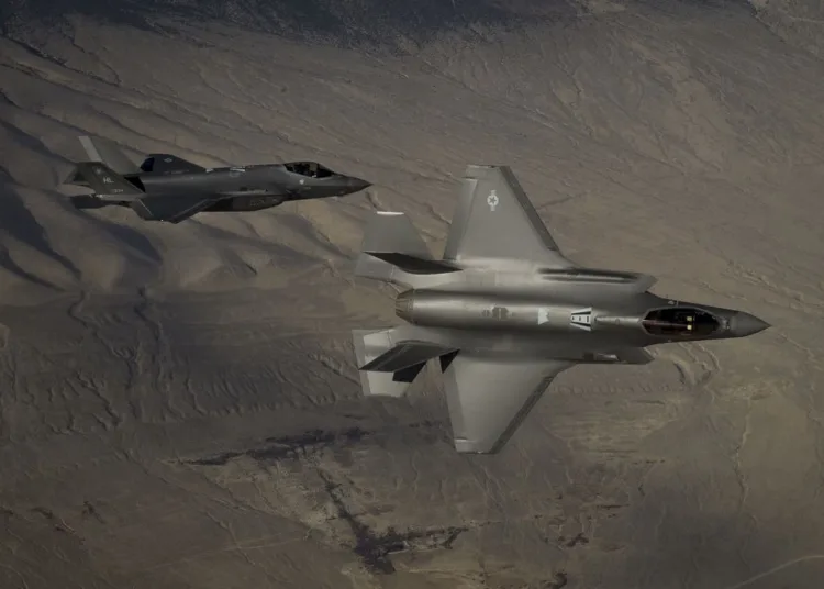 Two U.S. Air Force F-35A Lightning IIs, assigned to the 4th Fighter Squadron from Hill Air Force Base, Utah, conduct flight training operations over the Utah Test and Training Range on Feb 14, 2018. The F-35 is designed to provide the pilot with unsurpassed situational awareness, positive target identification and precision strike in all weather conditions. (U.S. Air Force photo by Staff Sgt. Andrew Lee)