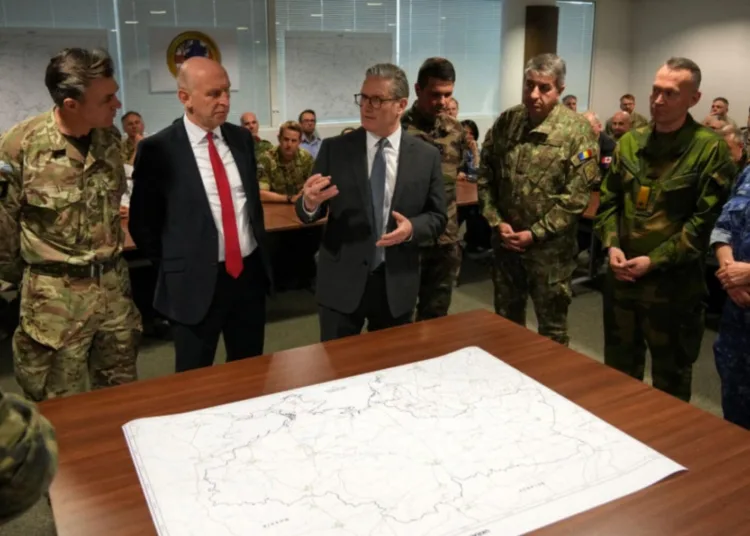 Alastair Grant/Pool via REUTERS