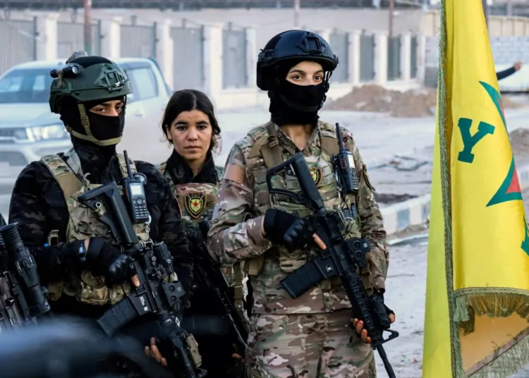 Female members of the Syrian Democratic Forces (SDF) deploy outside Ghwayran prison in Syria's northeastern city of Hasakeh on January 26, 2022, after having declared over the facility following its takeover by Islamic State (IS) group forces. - Kurdish forces on January 26 retook full control of the prison in northeast Syria where Islamic State group jihadists had been holed up since attacking it six days earlier. The brazen IS jailbreak attempt and ensuing clashes left more than 180 dead in the jihadists' most high-profile military operation since the loss of their "caliphate" nearly three years ago. (Photo by AFP)