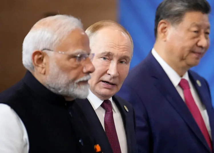 Narendra Modi, Vladimir Putin y Xi Jinping durante la cumbre de los BRICS en Rusia, el año pasado.Fotógrafo: Alexnder Zemlianichenko/AFP/Getty Images