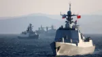 Buques de guerra chinos y rusos transitan por una zona marítima simulada minada durante el ejercicio naval Joint Sea-2021 en la mañana del 15 de octubre. [Foto/Xinhua]