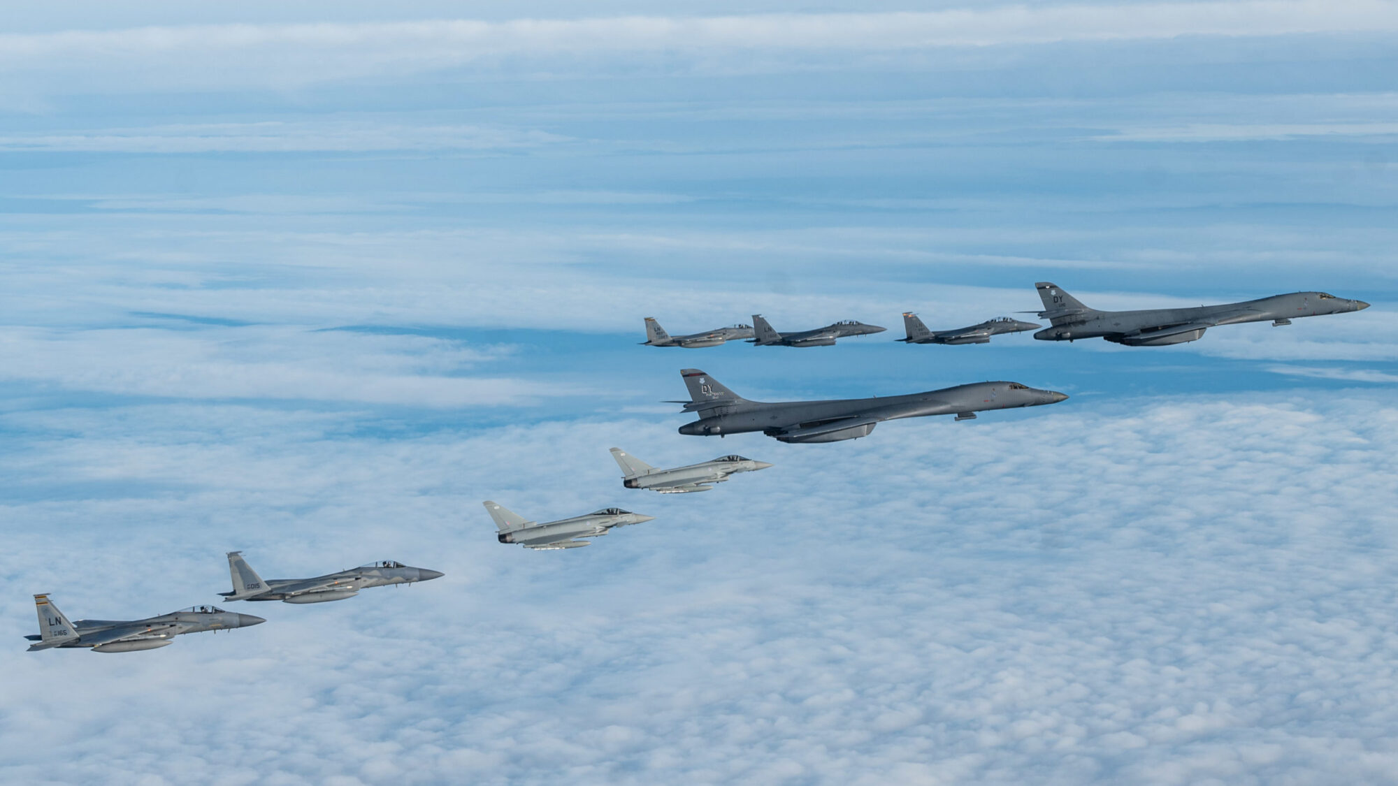 US Air Force F-15C Eagles and F-15E Strike Eagles, and Royal Air Force Typhoon FGR4 aircraft, during a bomber task force mission.