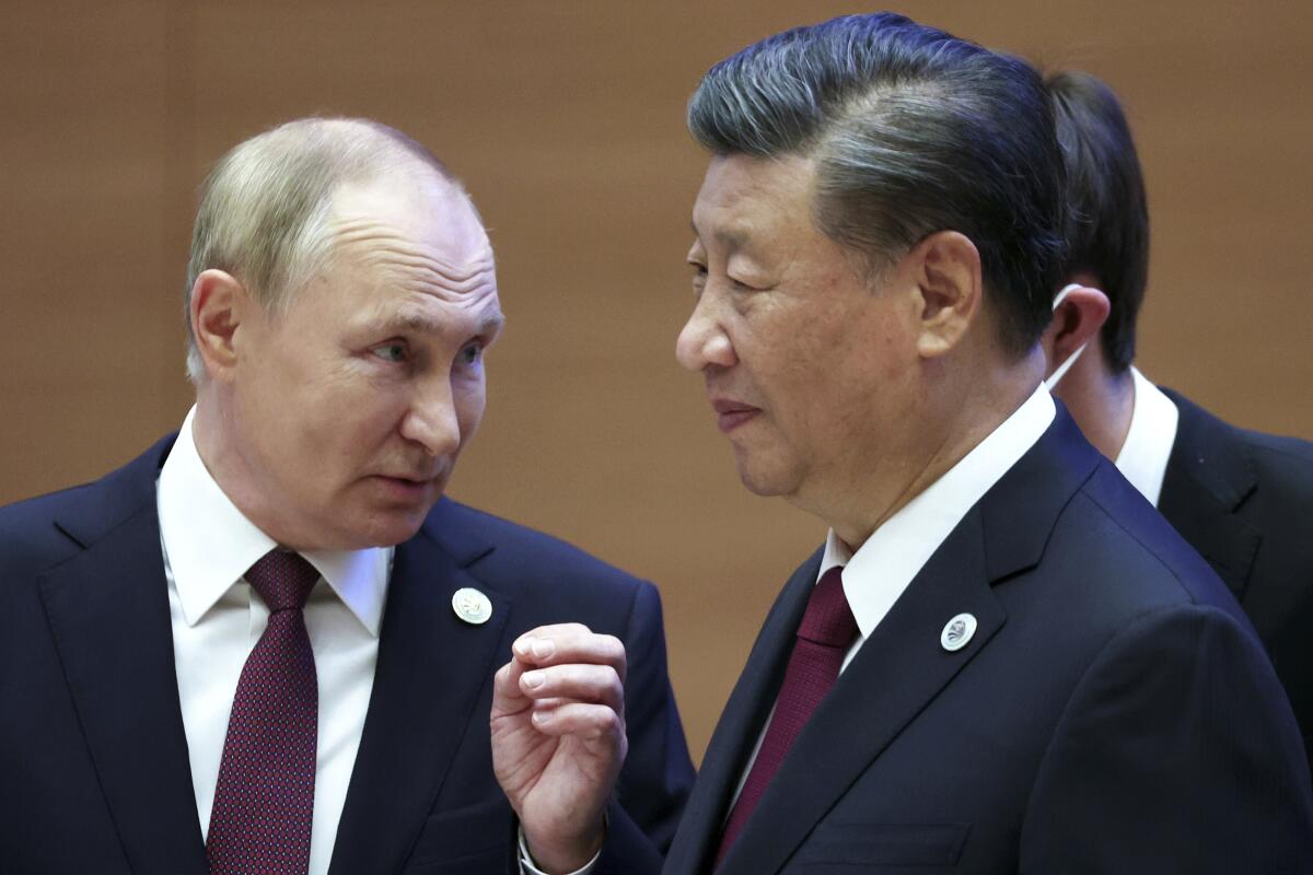 El presidente de Rusia, Vladimir Putin, junto al presidente de China, Xi Jinping.