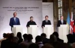 El canciller alemán Friedrich Merz, el presidente ucraniano Volodymyr Zelenskiy, el presidente francés Emmanuel Macron y el primer ministro británico Keir Starmer dirigen una rueda de prensa tras la cumbre de la Coalición de la Voluntad sobre garantías de seguridad para Ucrania en el Hotel des Invalides de París, Francia, el 13 de julio de 2026. Créditos: TERESA SUAREZ/Pool vía REUTERS
