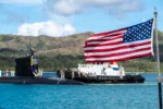 El submarino de ataque rápido de clase Virginia USS Minnesota (SSN 783) transita por el puerto de Apra mientras regresa a su base naval en Guam el 29 de julio de 2026. Créditos: Armada de EE.UU.