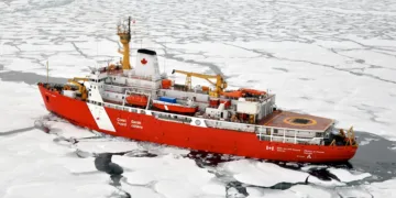 Canadian icebreaker the Louis St Laurent breaks ice in 2009 in the Arctic. Photograph: US Coast Guard Photo/Alamy